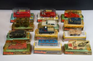 12 Boxed Dinky diecast models to include 2 x 282 Land Rover Fire Appliance, 296 Duple Viceroy 37