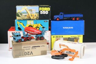 Six boxed construction diecast models to include NZG No. 130 Ford 550 Tractor Backhoe Loader