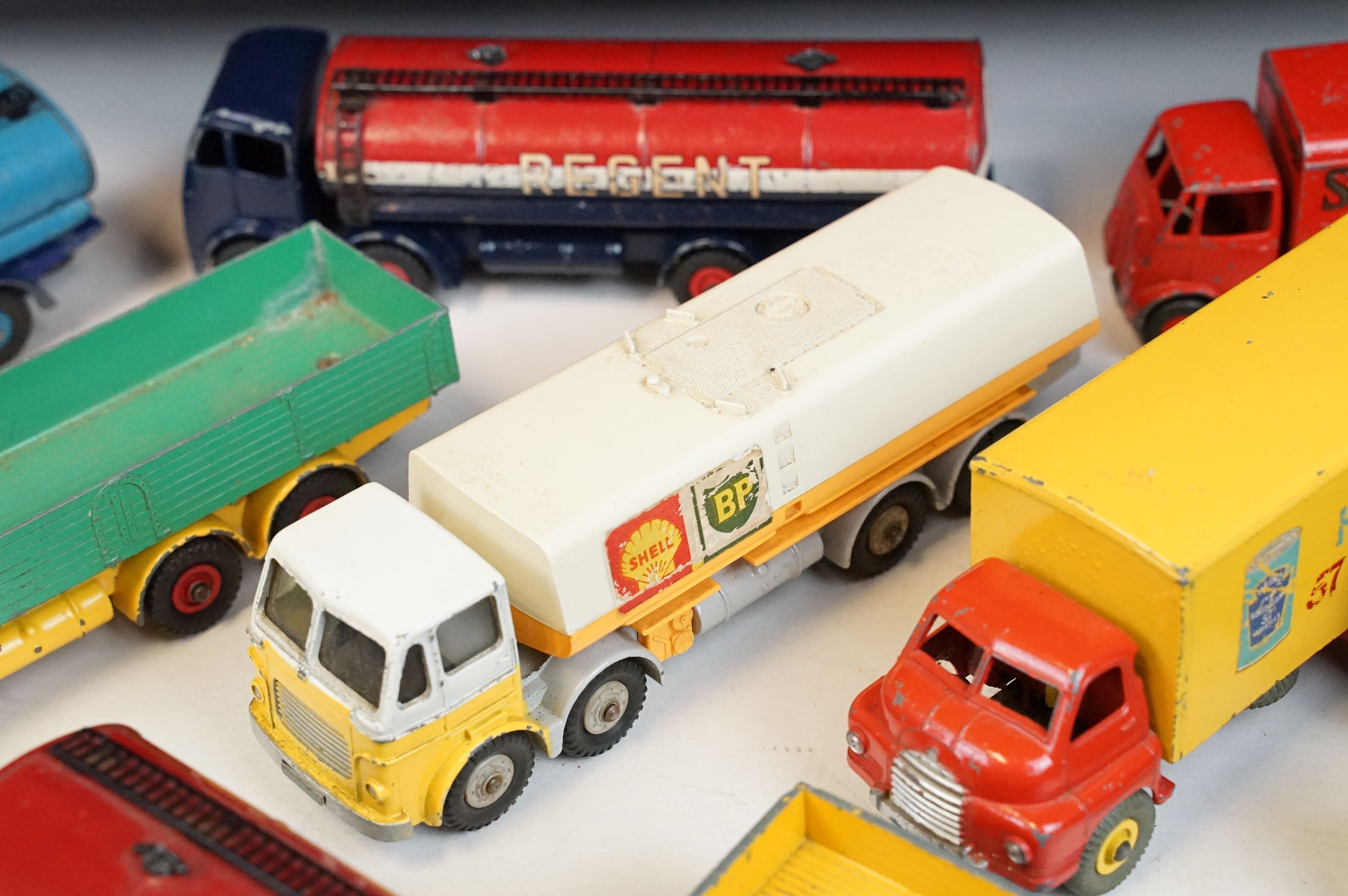 12 Mid 20th C Dinky diecast models to include Foden Fuel Tanker in Two-Tone light blue and dark blue - Image 6 of 9