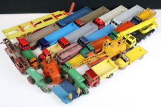 25 Mid 20th C play worn Dinky diecast models to include various Foden examples, Leyland Comet,
