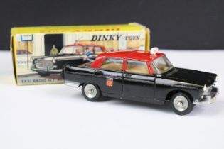 Boxed French Dinky 1400 Taxi Radio G7 404 Peugeot diecast model in black, with red roof, tan