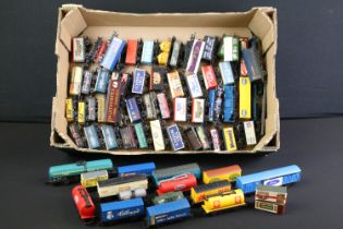 65 OO gauge items of rolling stock to include Hornby, Lima, Triang etc featuring wagons, vans and