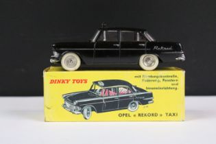 Boxed French Dinky 546 Opel Rekford 'Taxi' diecast model in all black with roof sign, red