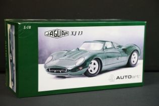 Boxed AutoArt 1/18 scale 73541 Jaguar XJ 13 diecast model in green, ex, box showing squashing to one