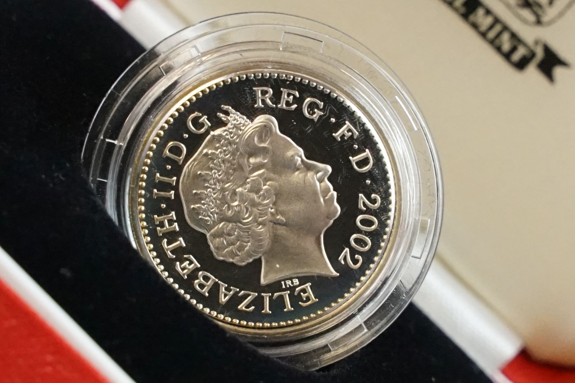 A collection of four Royal Mint silver proof £1 coins to include 2002, 1985, 1983 and 1988 examples, - Image 13 of 13