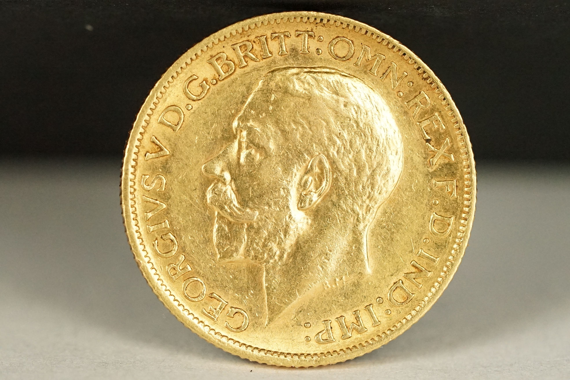 A King George V 1911 gold full sovereign coin with Sydney Mint mark. - Image 2 of 3