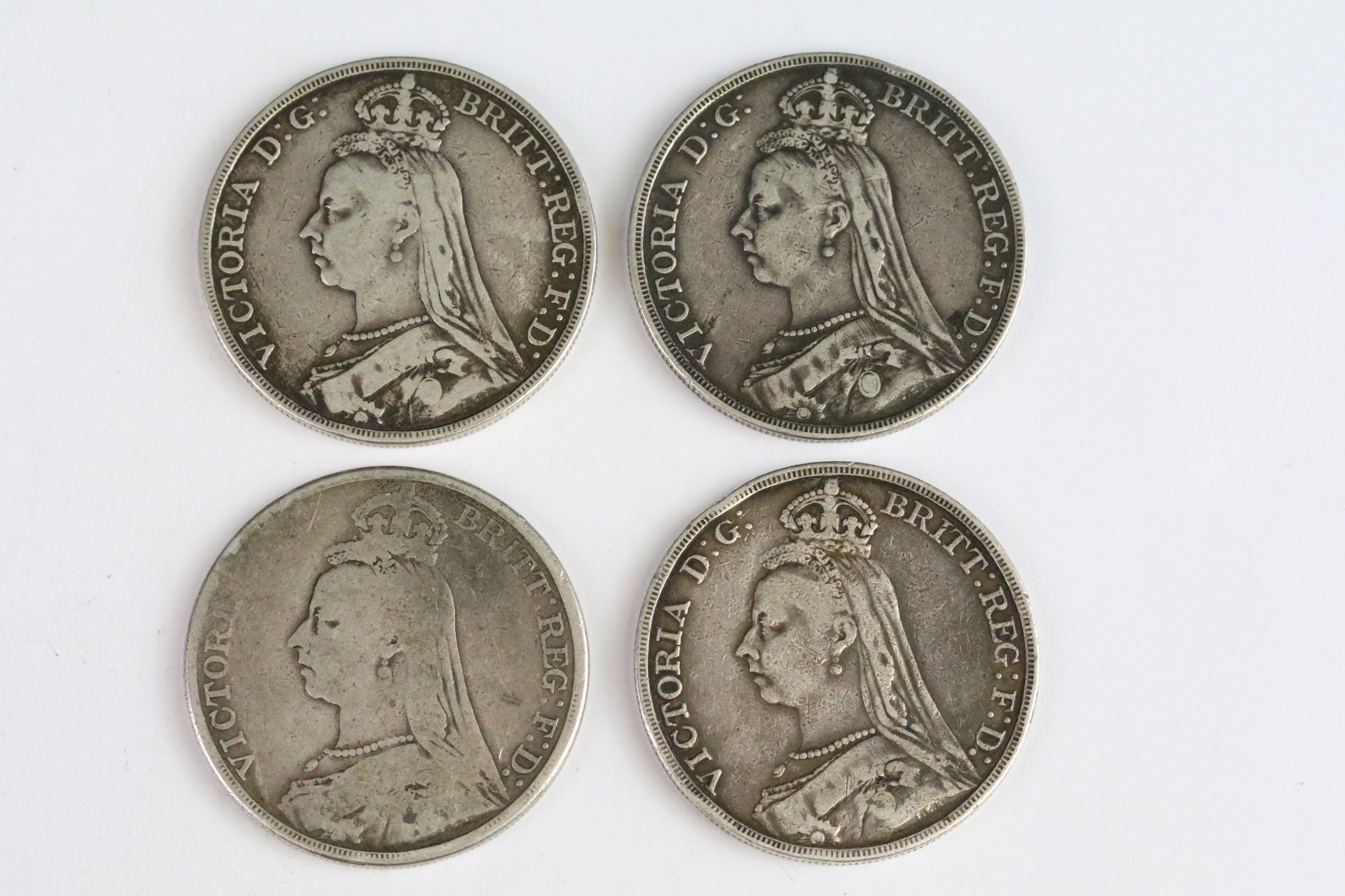 A collection of four British Queen Victoria pre decimal silver full crown coins to include 1889, - Image 3 of 3