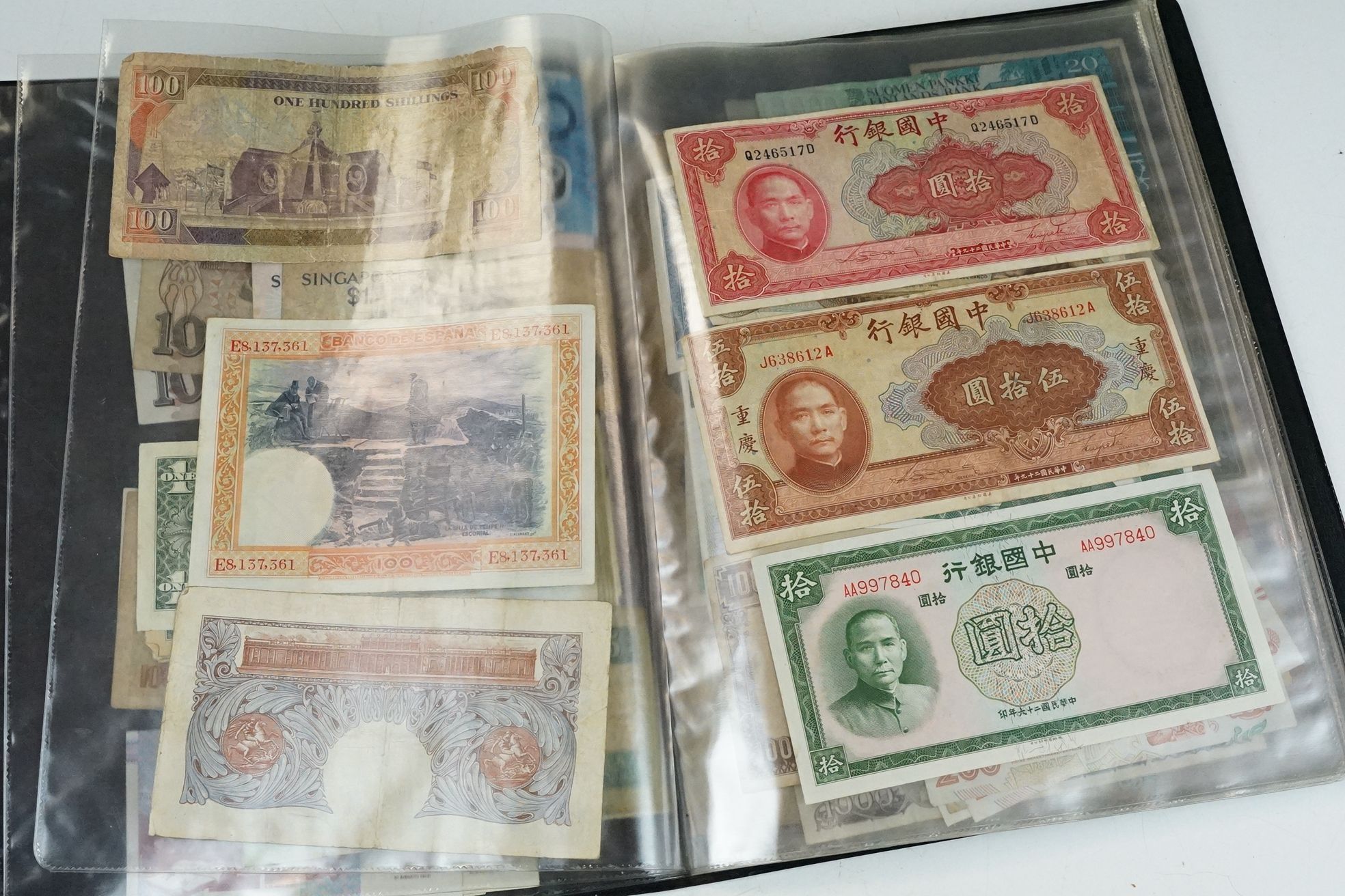 A collection of British and World banknotes contained within a folder to include China, Germany, - Bild 4 aus 19