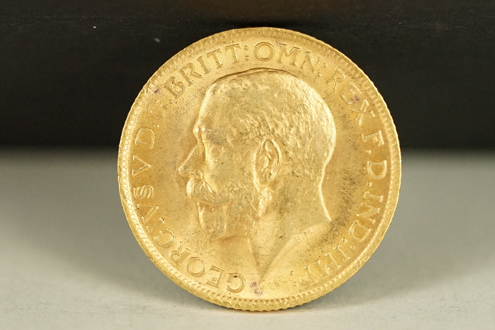 A British King George V 1915 gold full sovereign coin. - Image 2 of 3