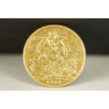 A British King Edward VII 1910 gold full sovereign coin.
