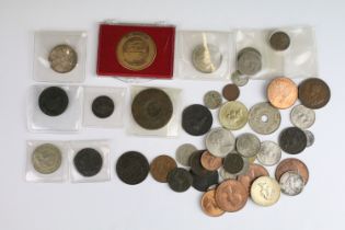 A small collection of British pre decimal and World coins to include early milled and silver