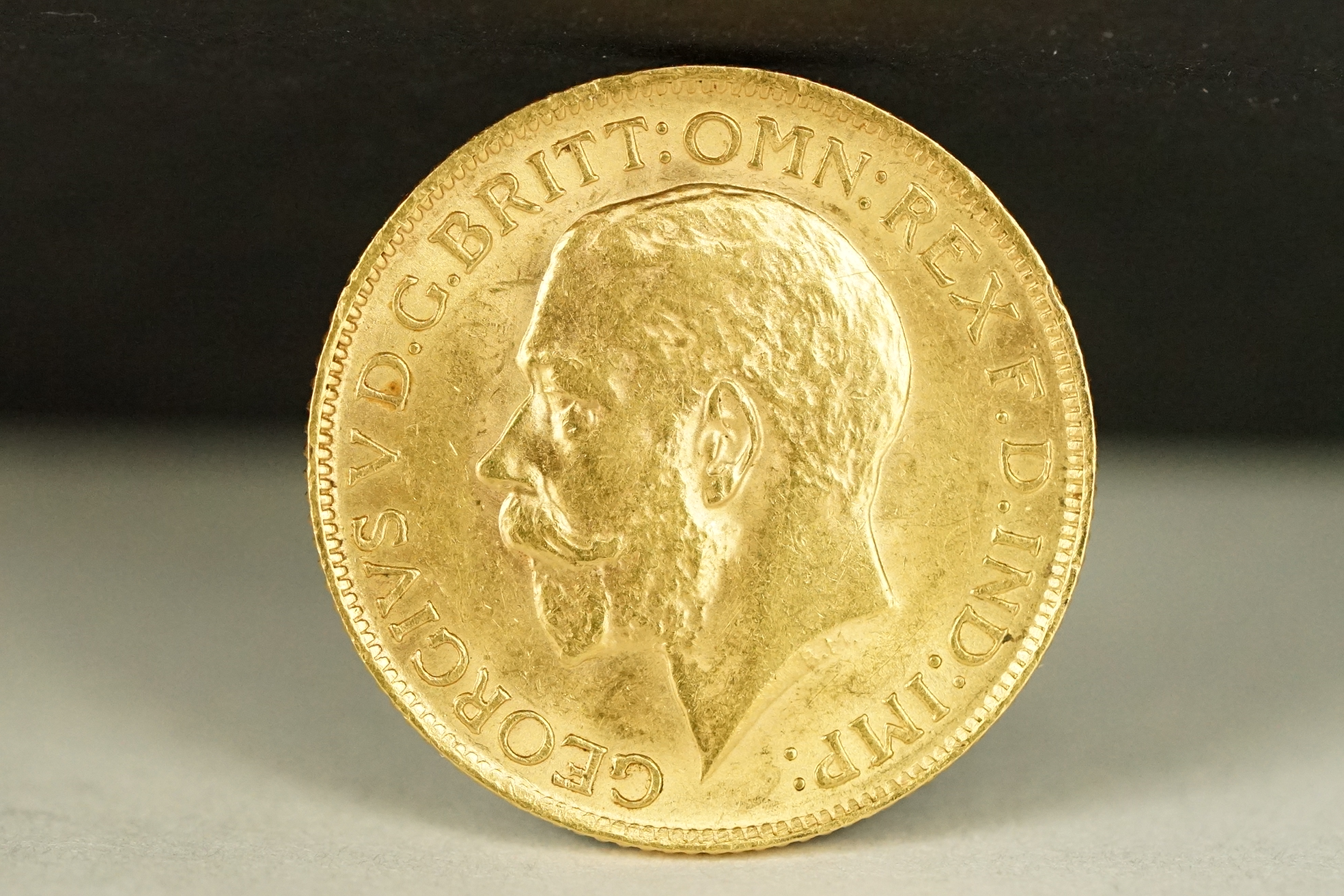 A British King George V 1913 gold full sovereign coin. - Image 2 of 3