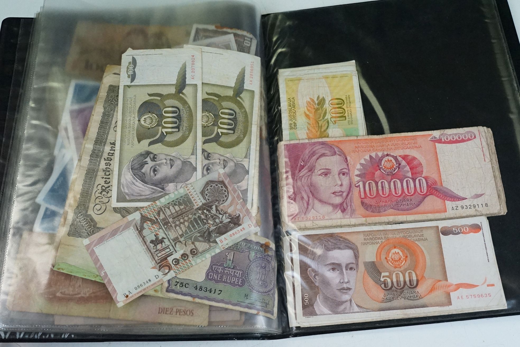 A collection of British and World banknotes contained within a folder to include China, Germany, - Bild 18 aus 19