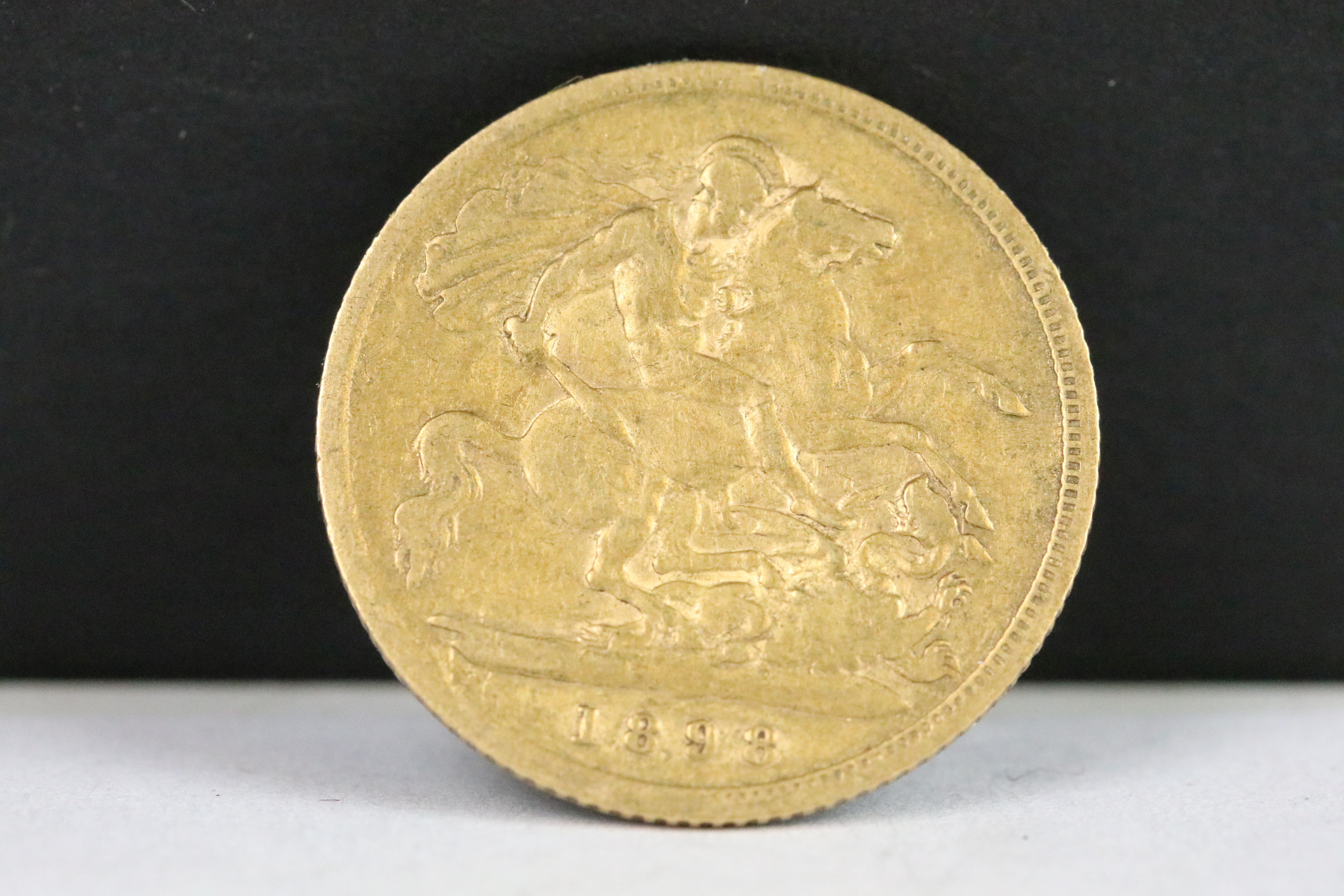 A British Queen Victoria 1893 gold half sovereign coin.