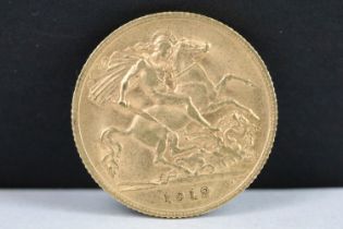 A British King George V 1912 gold half sovereign coin.