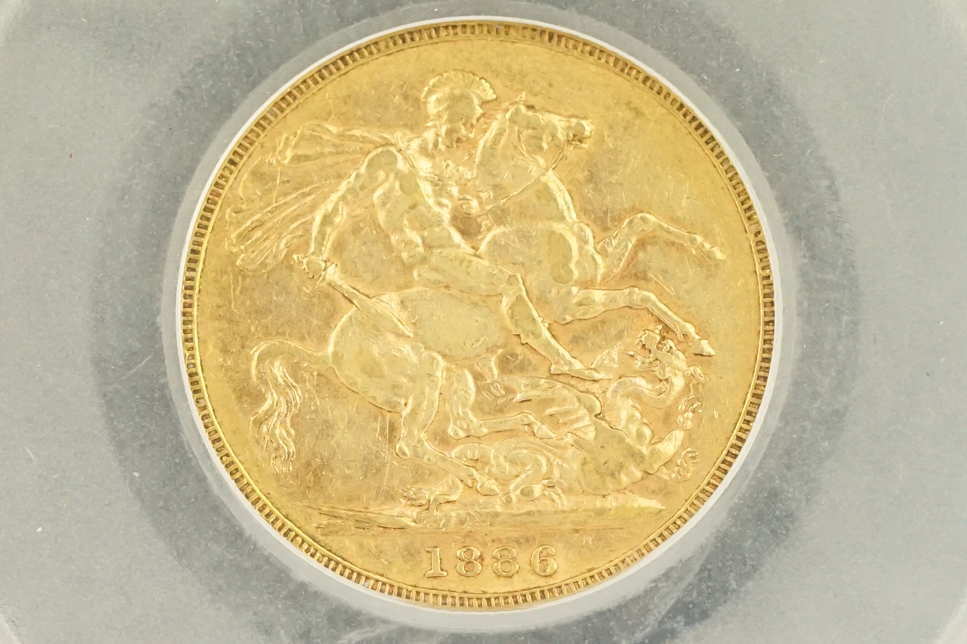 A Queen Victoria 1886 Melbourne Mint gold full sovereign coin, CGS slab mounted. - Image 3 of 7