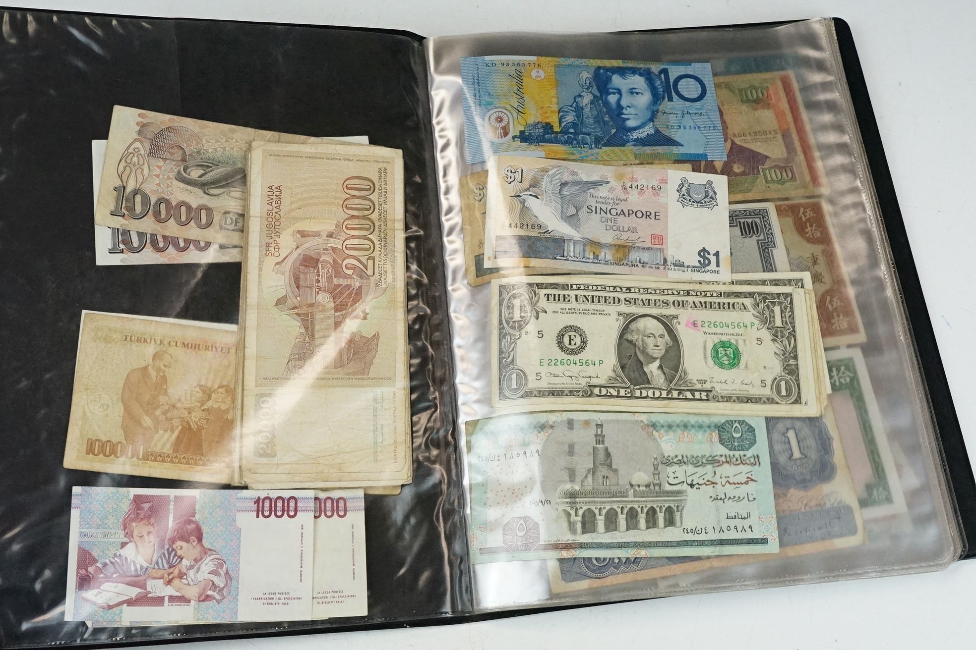 A collection of British and World banknotes contained within a folder to include China, Germany, - Image 2 of 19