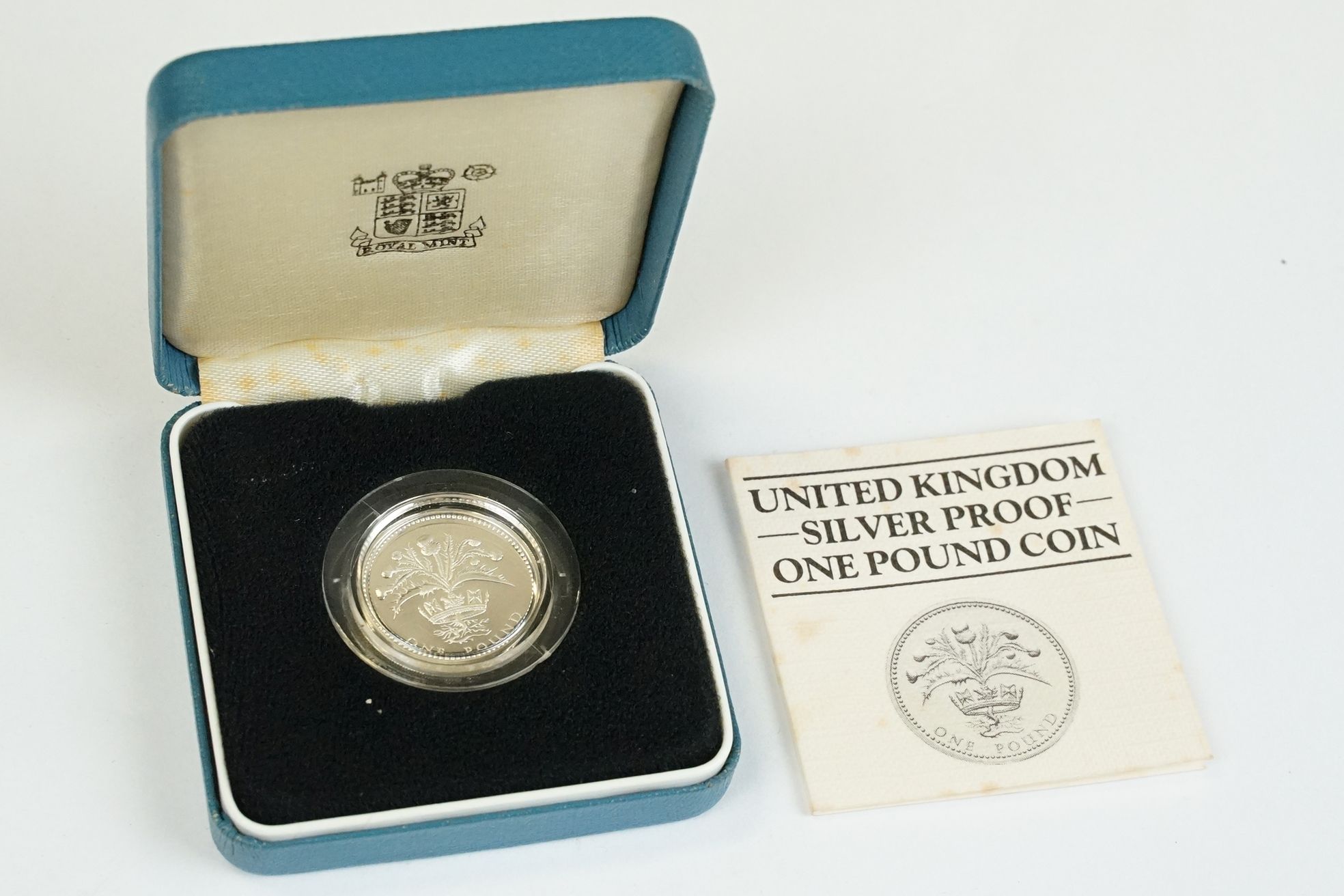 A collection of four Royal Mint silver proof £1 coins to include 2002, 2003, 1989 and 1984 examples, - Bild 11 aus 13