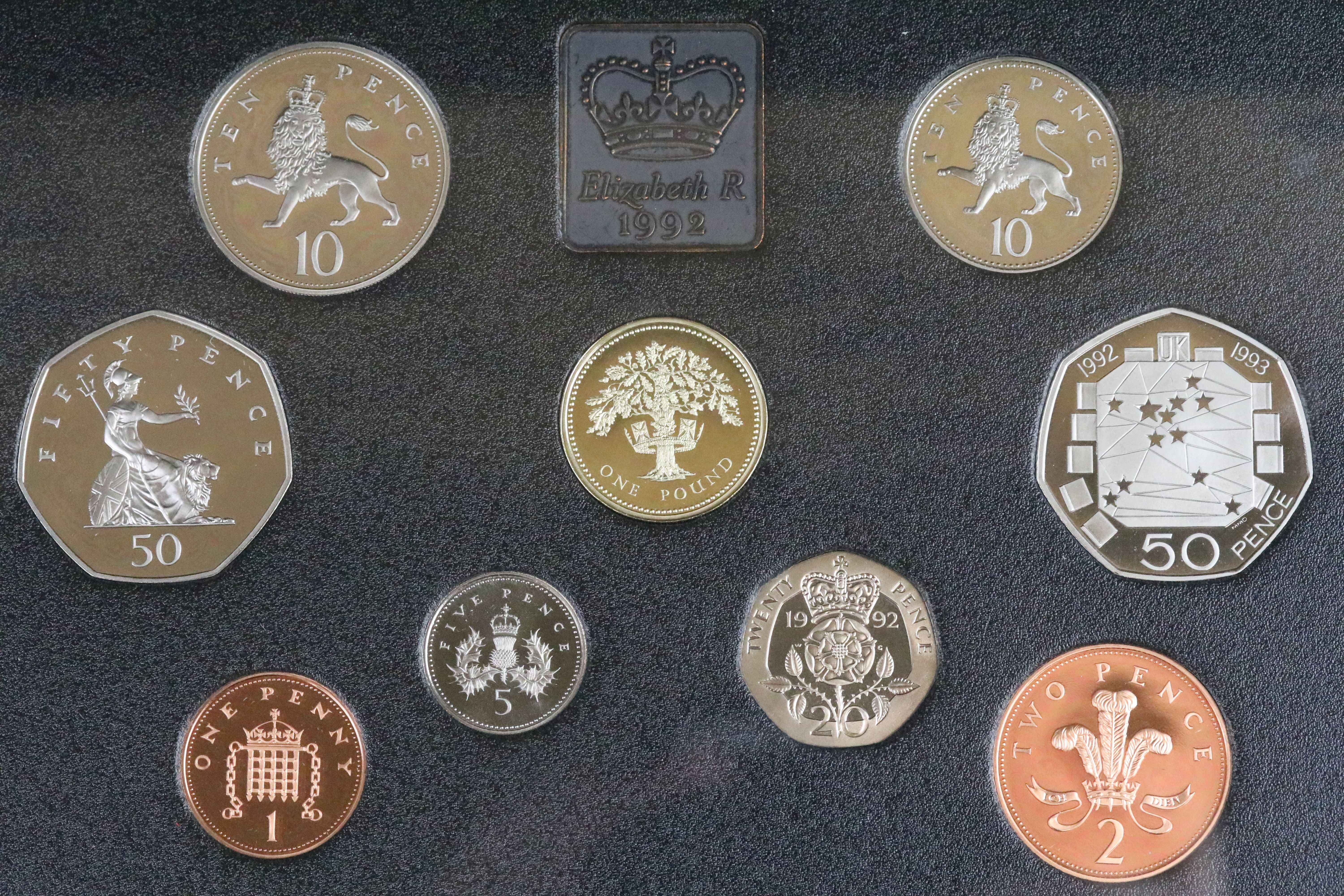 A collection of eight United Kingdom Royal Mint proof year sets to include 1984, 1993, 1991, 1997. - Image 7 of 9
