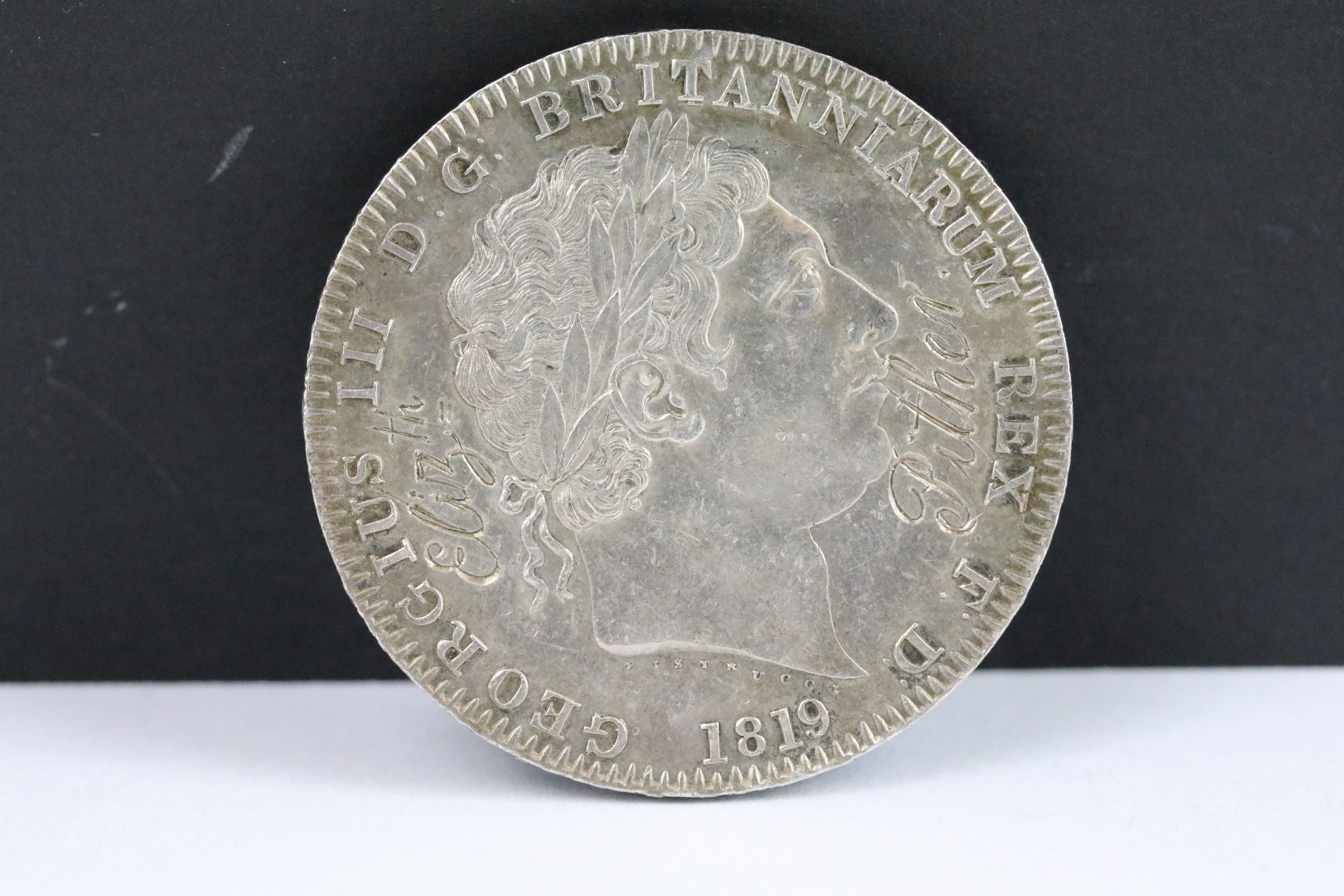 A British King George III 1819 silver crown coin. - Bild 2 aus 3