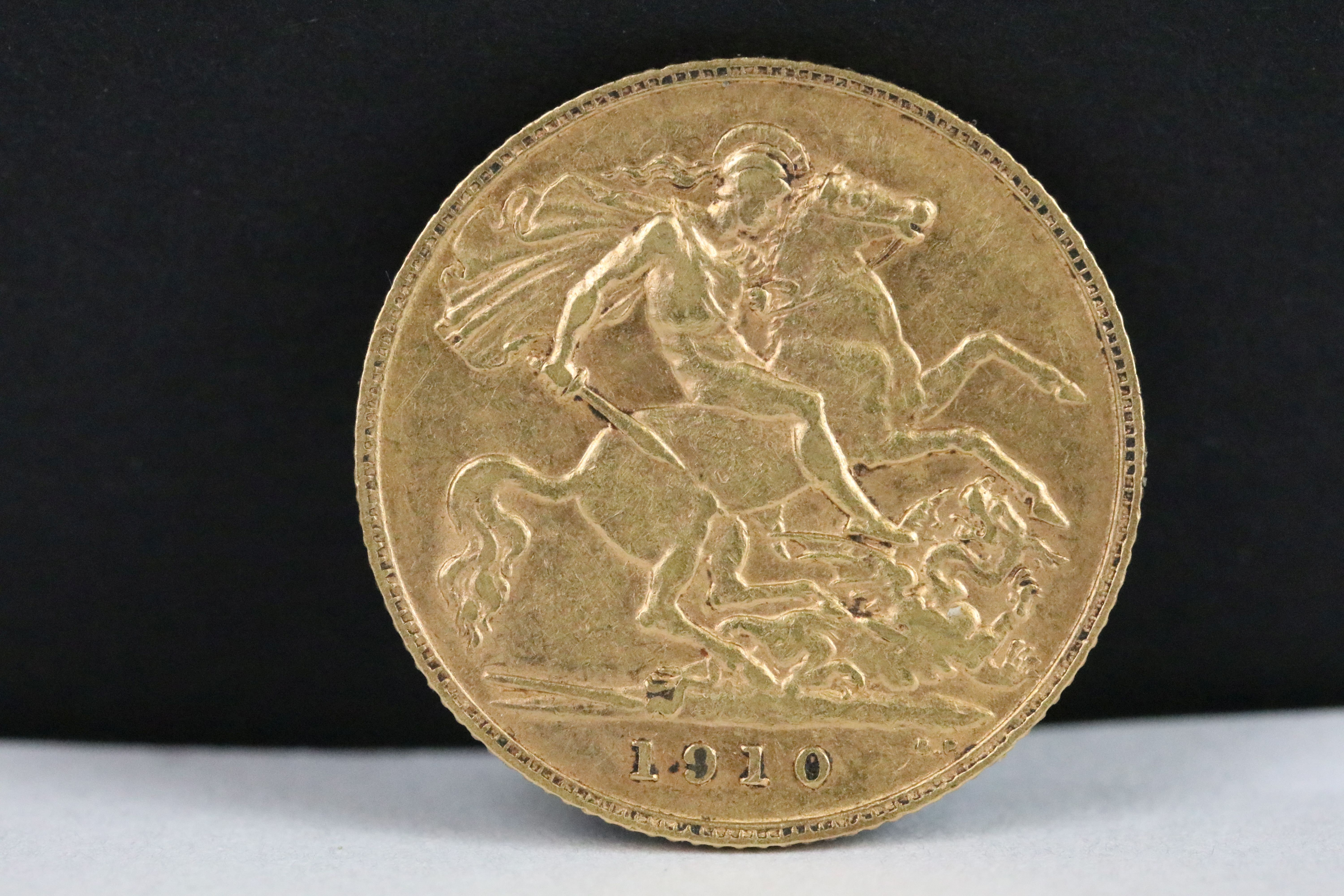 A British King Edward VII 1910 gold half sovereign coin.