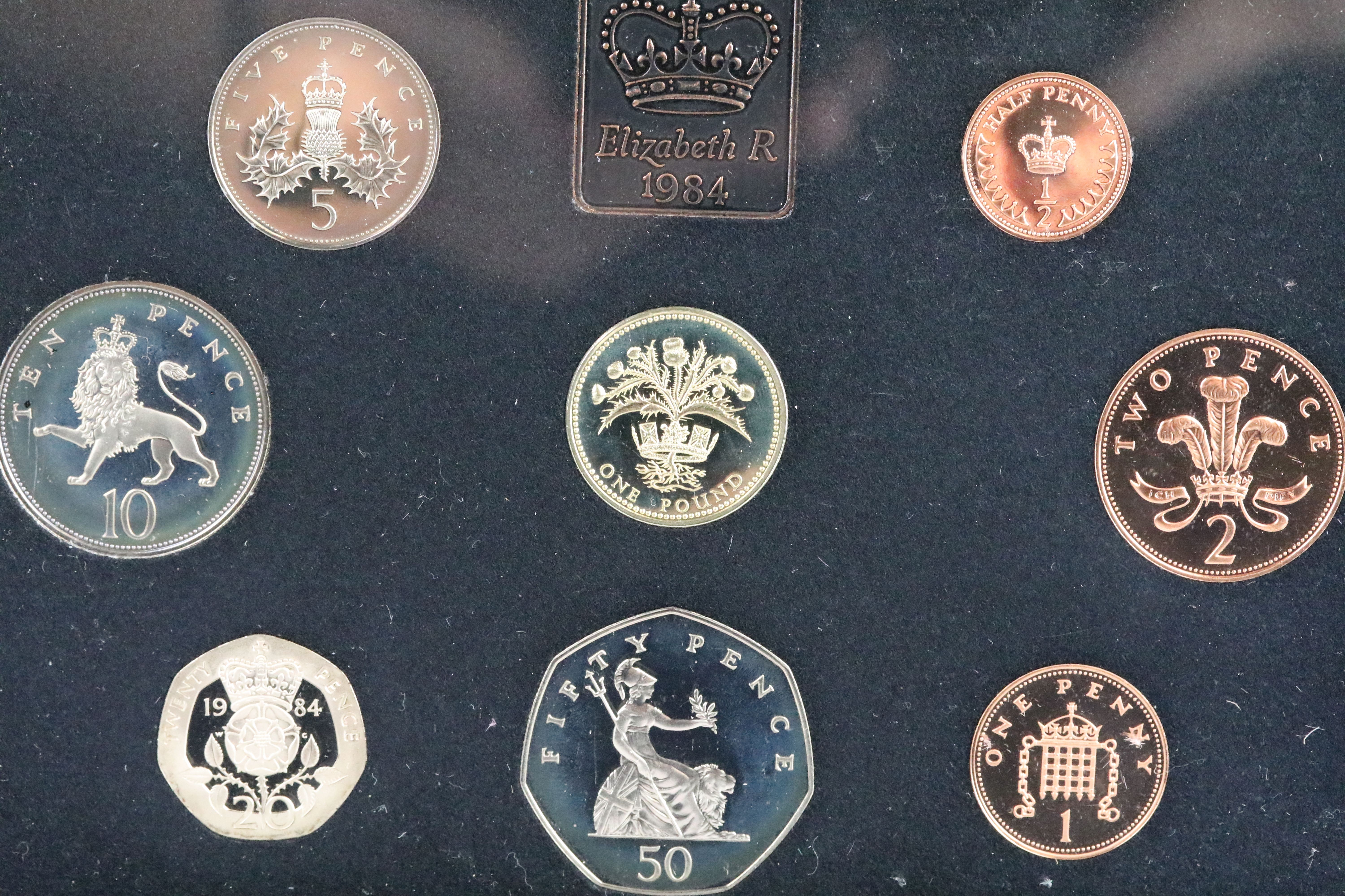 A collection of eight United Kingdom Royal Mint proof year sets to include 1984, 1993, 1991, 1997. - Image 5 of 9