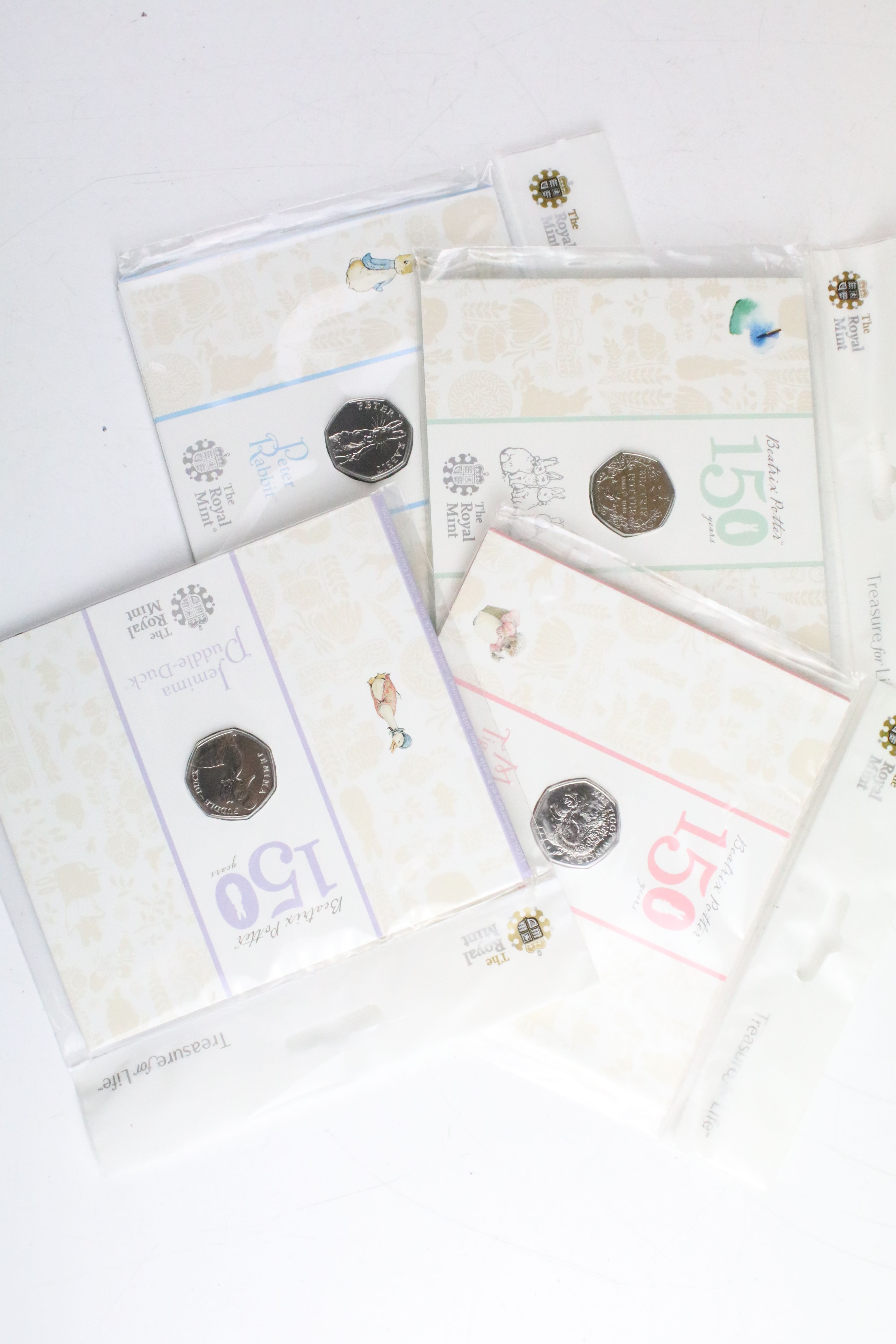 A collection of fifteen Royal Mint Beatrix Potter 50p coin collectors packs together with five - Image 2 of 8