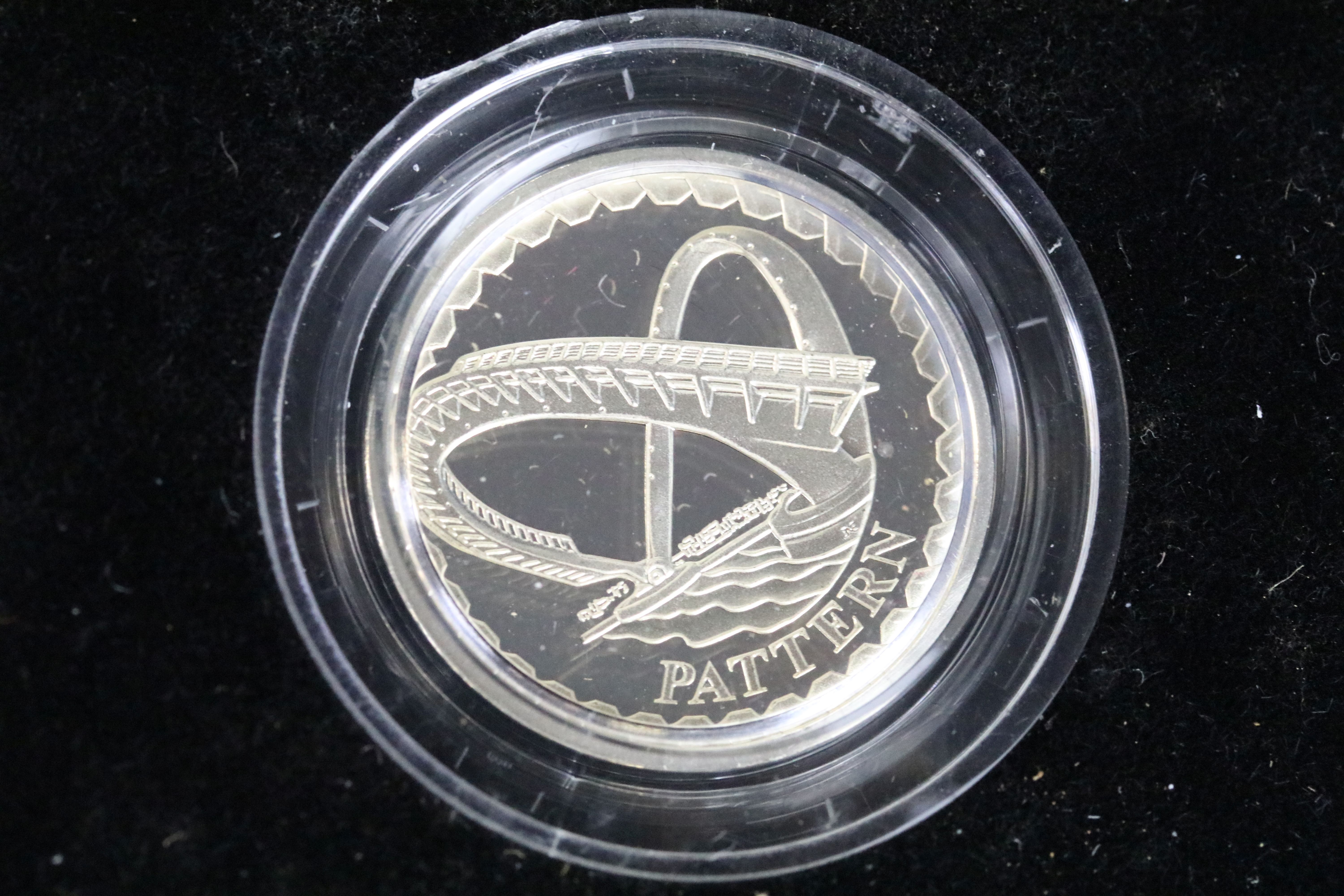 A Royal Mint United Kingdom silver proof £1 four coin pattern collection encapsulted within fitted - Image 5 of 6