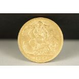 A British King Edward VII 1905 gold full sovereign coin.