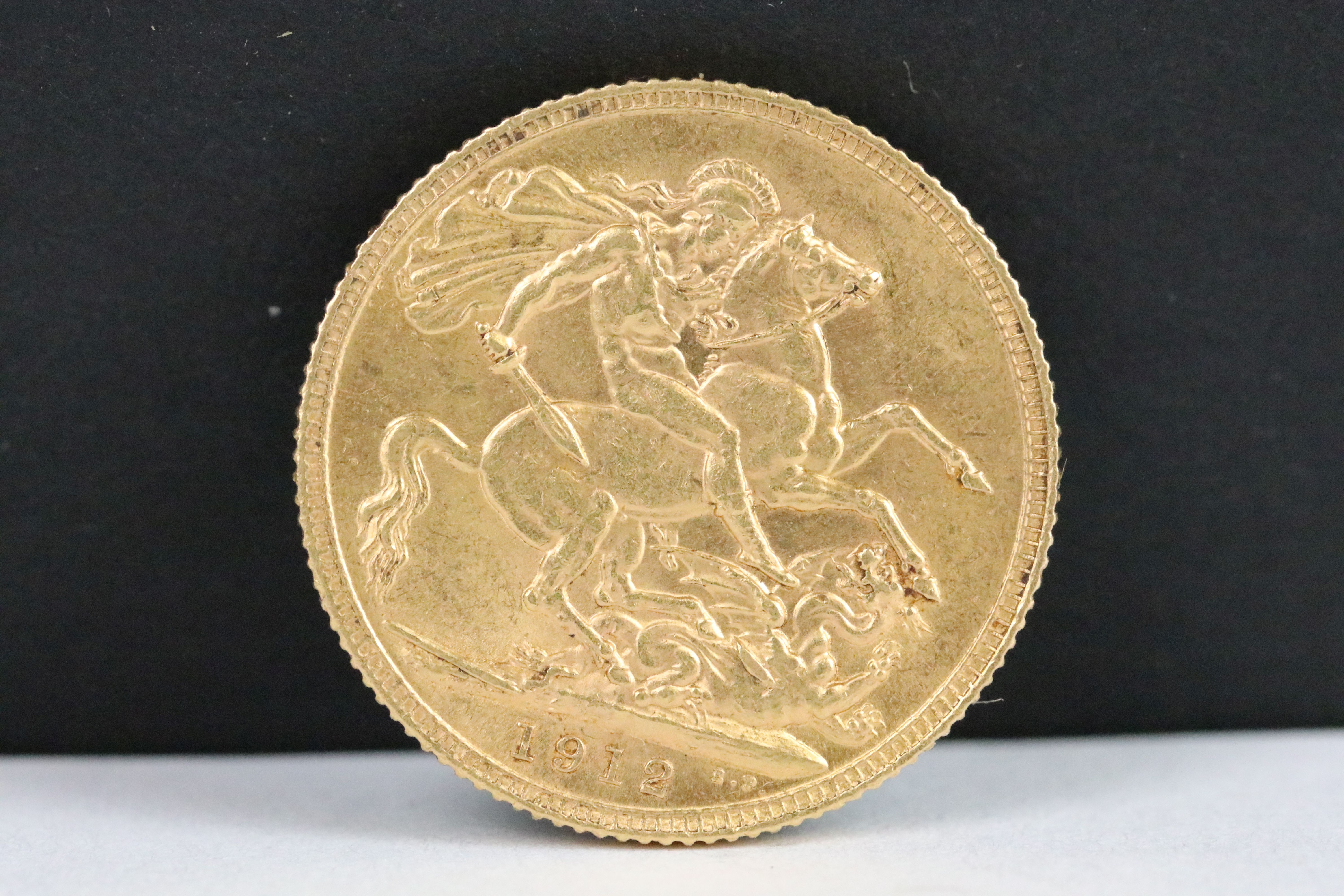 A British King George V 1912 full gold sovereign coin.
