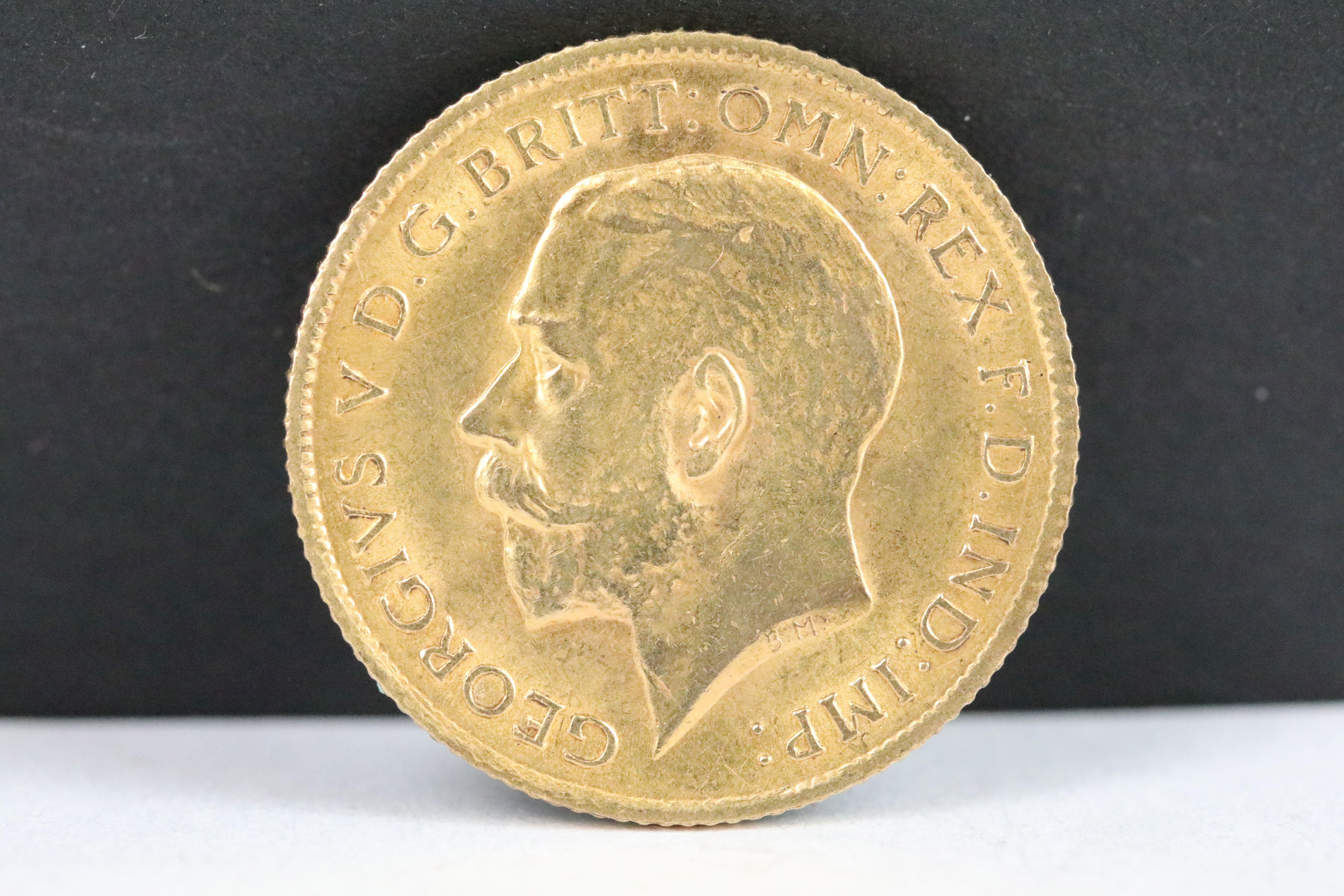 A British King George V 1912 gold half sovereign coin. - Image 2 of 3