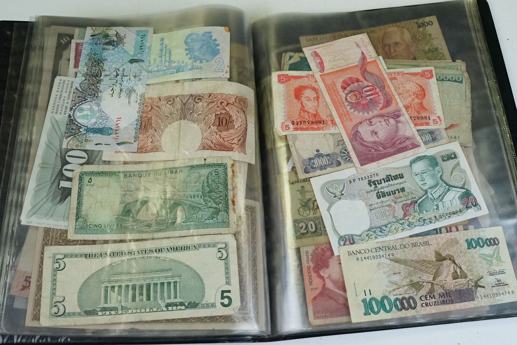 A collection of British and World banknotes contained within a folder to include China, Germany, - Bild 12 aus 19