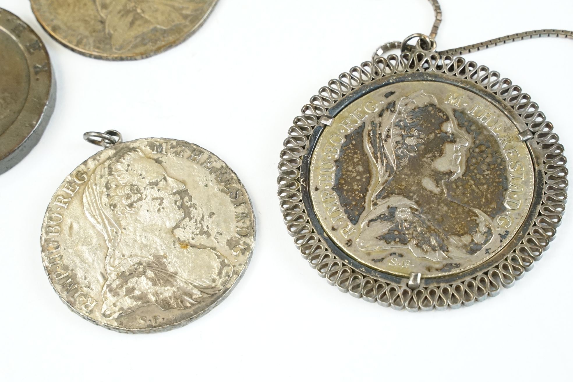 A small collection of four coins to include three 1780 silver Thalers and a British King George - Image 5 of 6