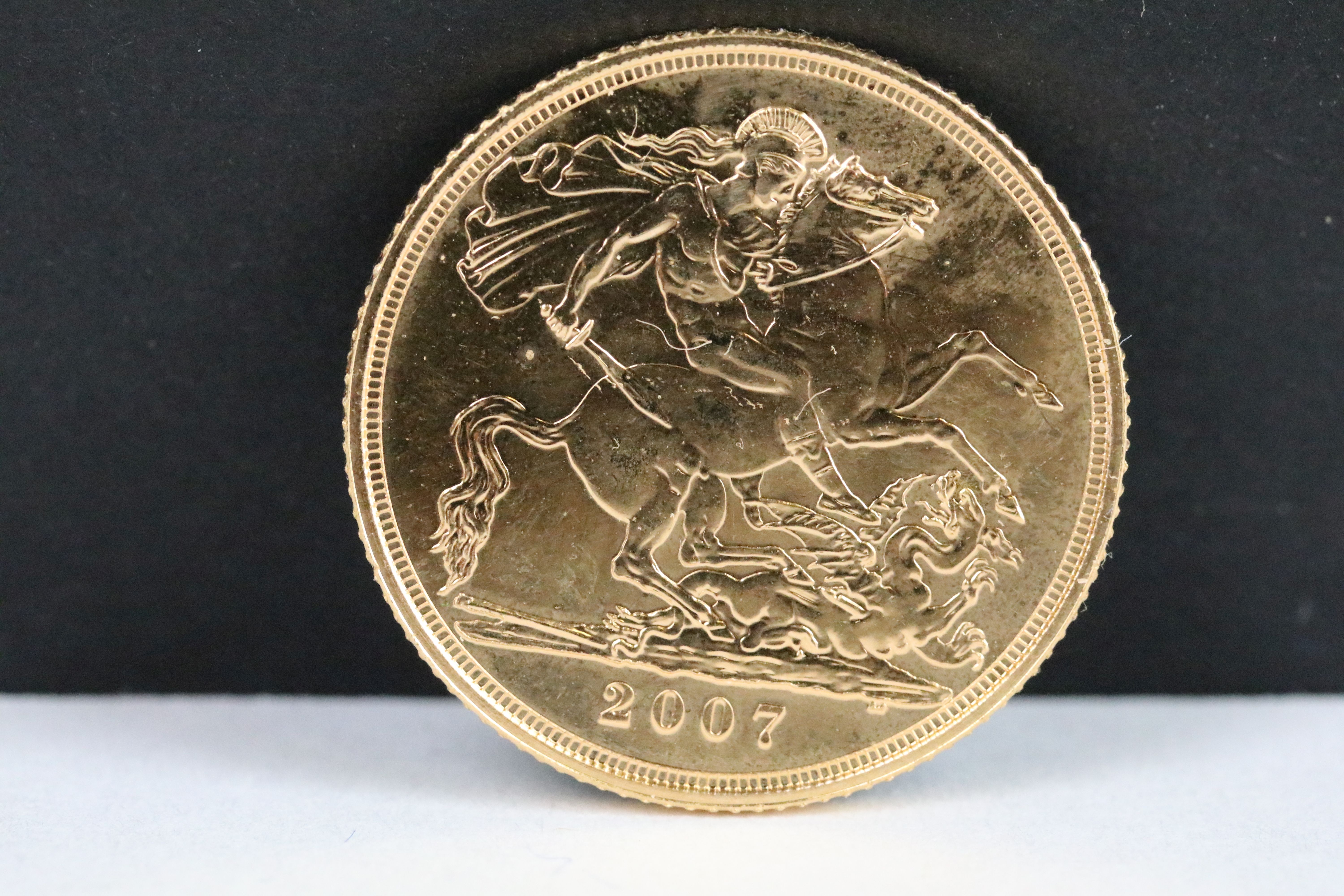 A British Queen Elizabeth II 2007 gold full sovereign coin.