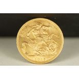 A British King George V 1915 gold full sovereign coin.