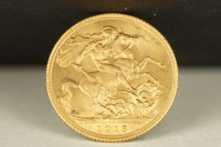 A British King George V 1915 gold full sovereign coin.