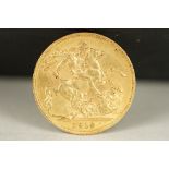 A British King George V 1912 gold full sovereign coin.