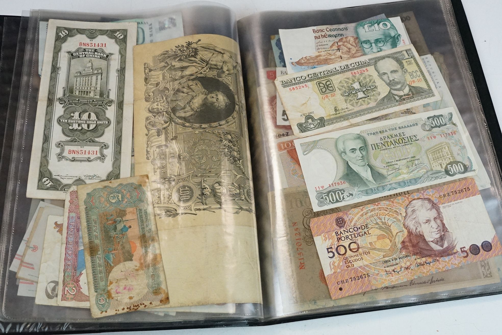 A collection of British and World banknotes contained within a folder to include China, Germany, - Bild 9 aus 19