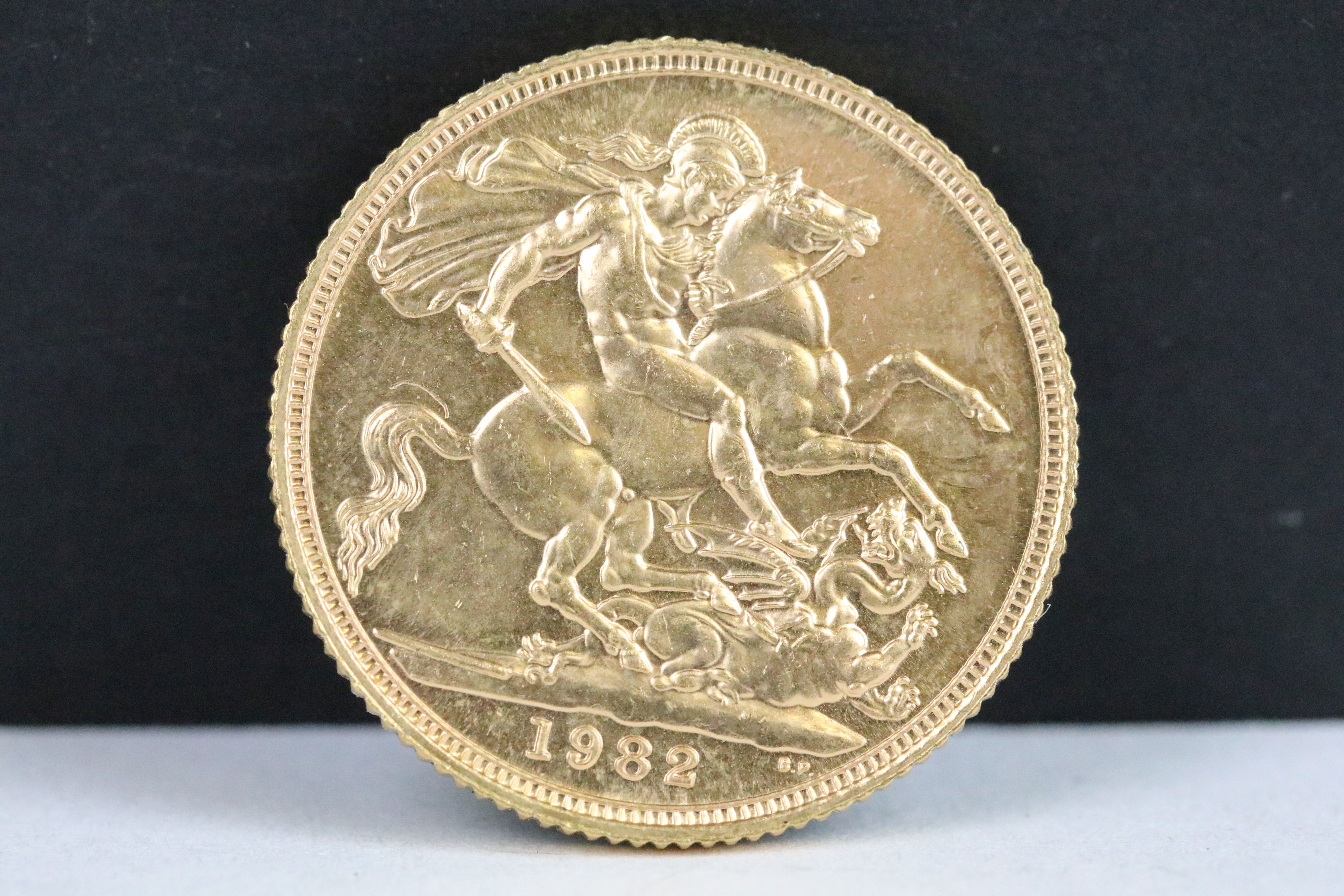 A British Queen Elizabeth II 1982 gold full sovereign coin.