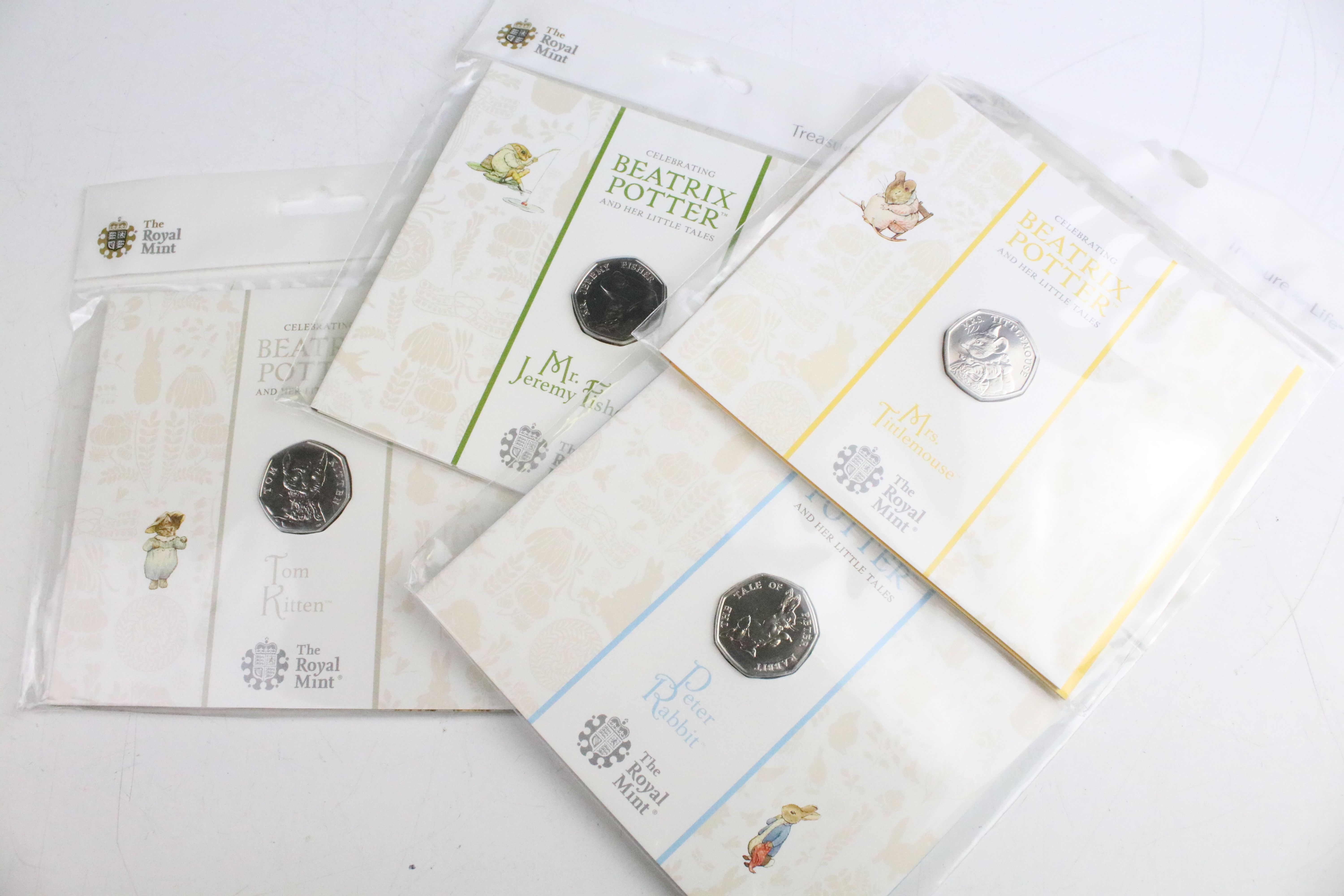 A collection of fifteen Royal Mint Beatrix Potter 50p coin collectors packs together with five - Bild 3 aus 8