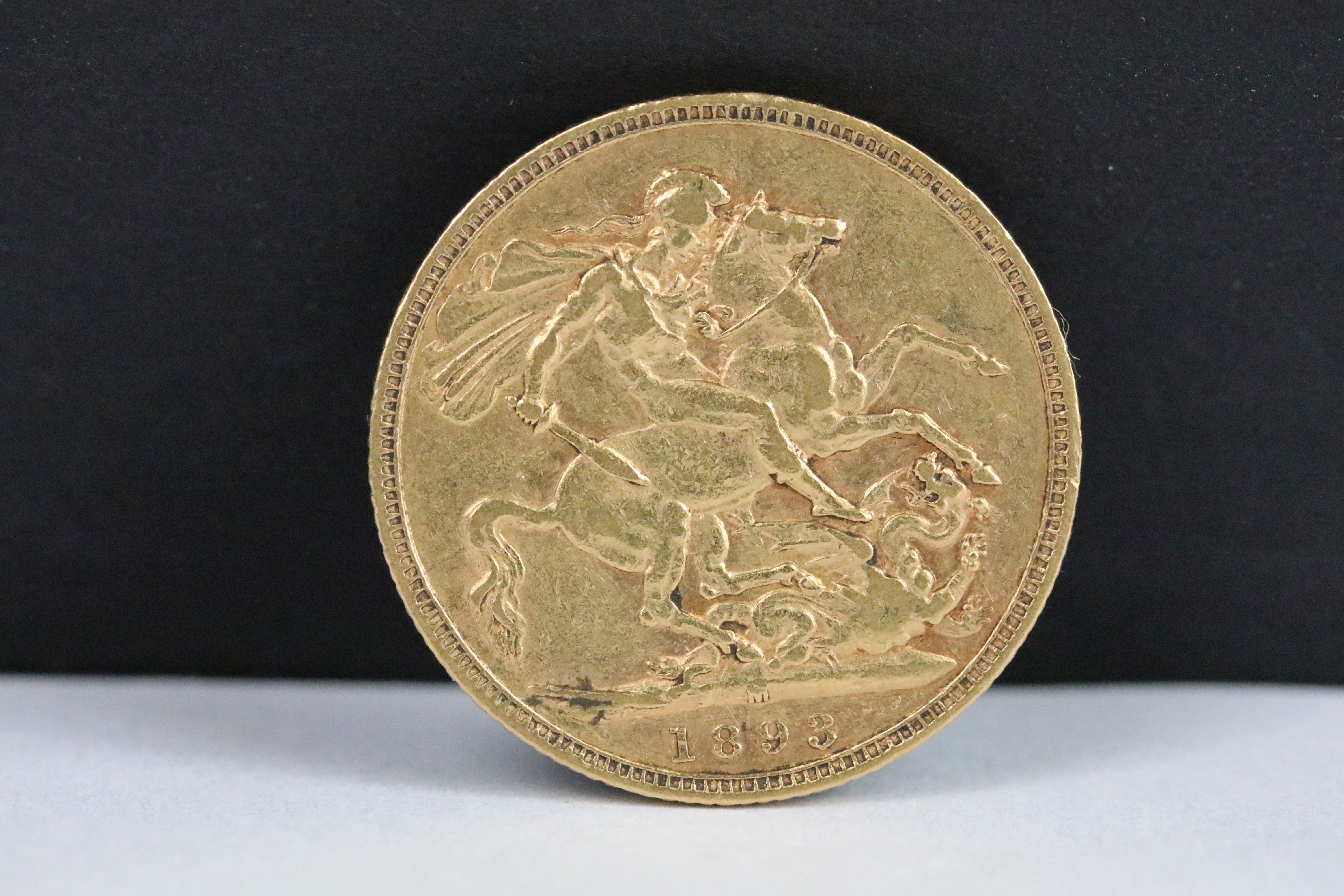 A British Queen Victoria 1893 gold full sovereign coin.