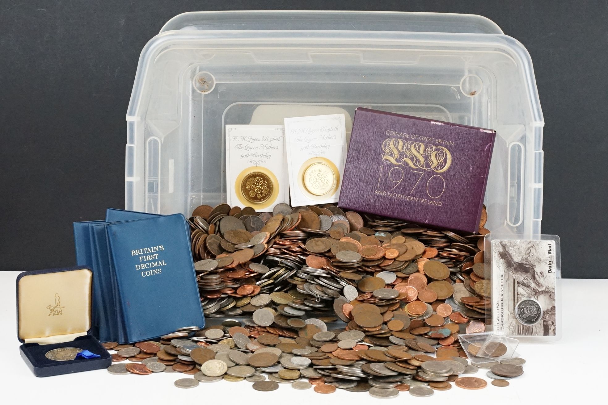 A large collection of British pre decimal and world coins to include a small quantity of silver