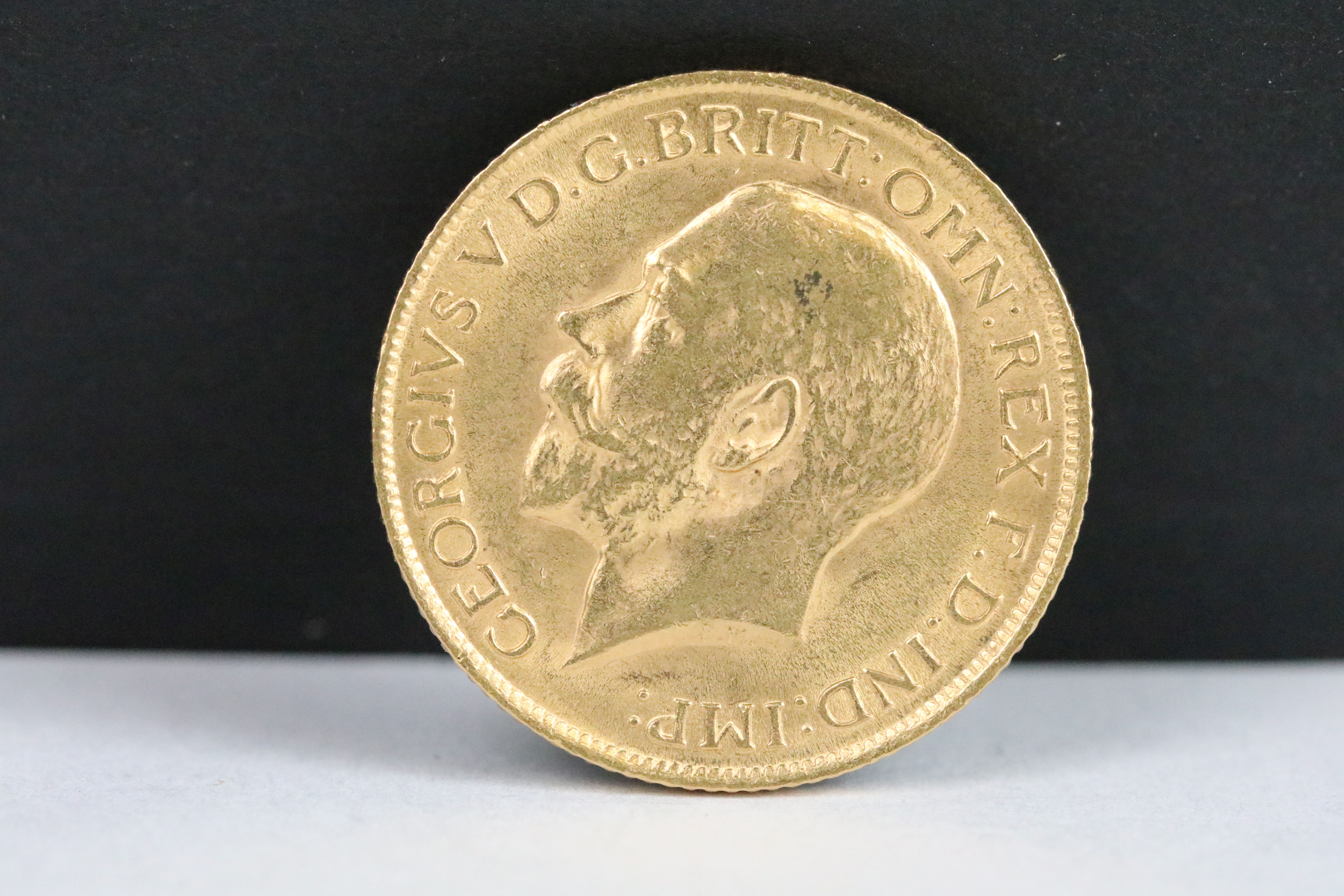 A British King George V 1913 gold full sovereign coin. - Image 2 of 3