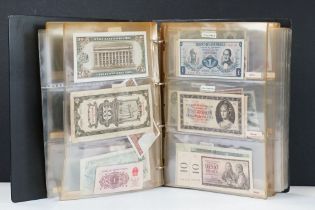 A large collection of British, Commonwealth and World banknotes contained within a collectors folder