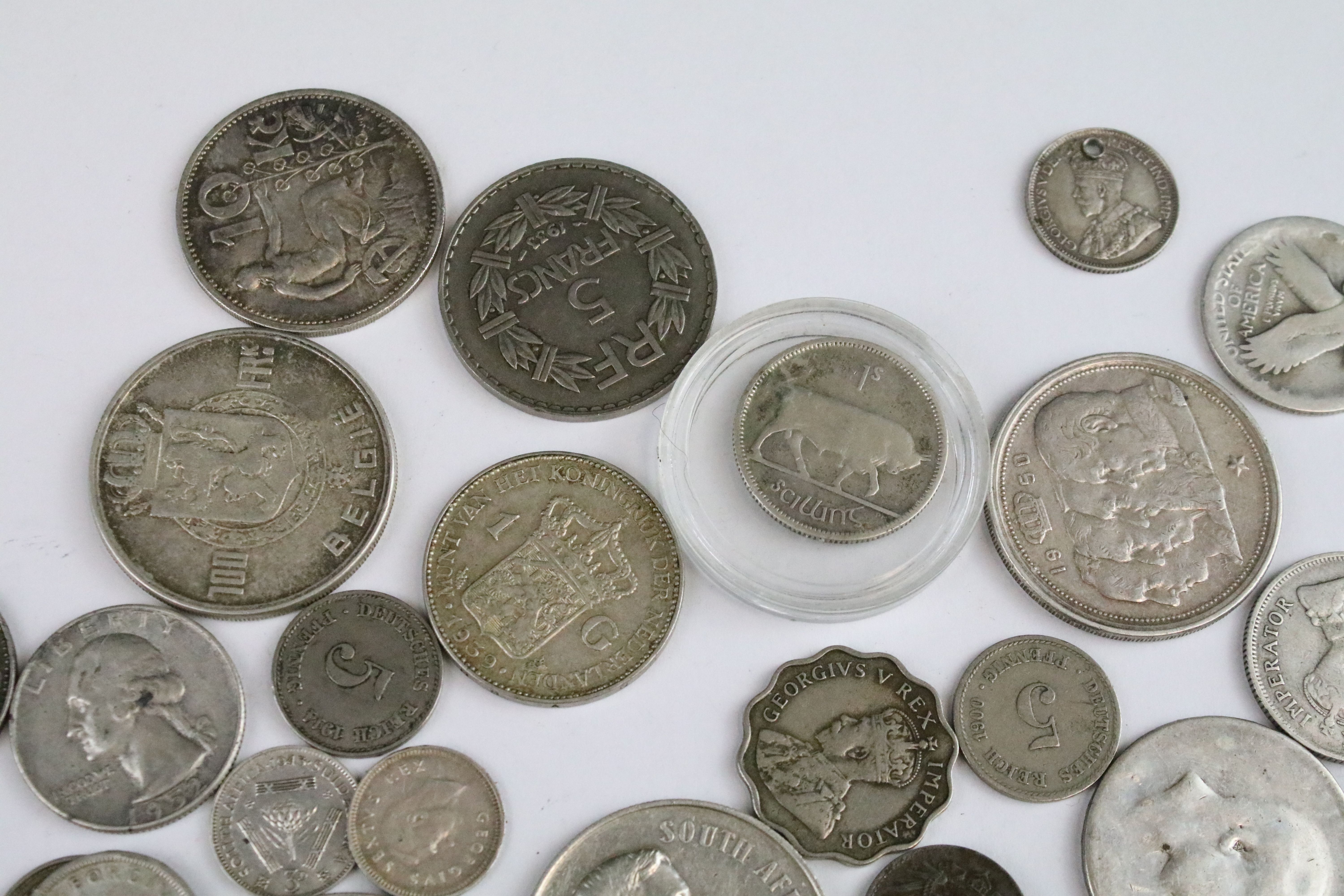 A collection of circulated world silver coins to include United States, German and India examples. - Image 8 of 9