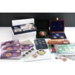 A collection of mixed coins to include uncirculated coin sets, proof like collectors coins and