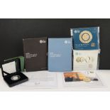 A collection of British uncirculated Royal Mint coin sets to include a Withdrawal from the