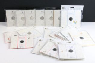 A collection of fifteen Royal Mint Beatrix Potter 50p coin collectors packs together with five