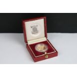 A British Royal Mint Queen Elizabeth II proof 1984 gold full sovereign coin encapsulated within