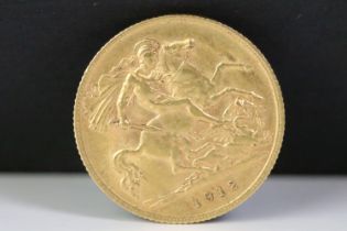 A British King George V 1912 gold half sovereign coin.